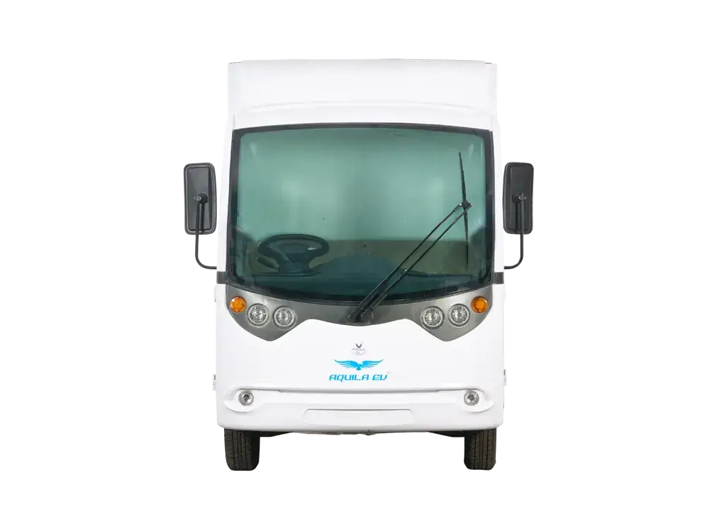 Front view of a white specialized electric cargo vehicle with a blue logo on the front, parked against a plain background.